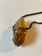 Beat Strong My Heart - Citrine Crystal Pendant on Chair